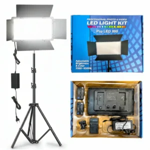Professional Varicolor Pro LED 800 video light panel on a tripod stand with adjustable barn doors and power adapt