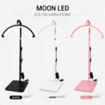 A 3 color variation of 23 inch Half Moon LED Lash Lamp standing upright on a flat rectangular base.